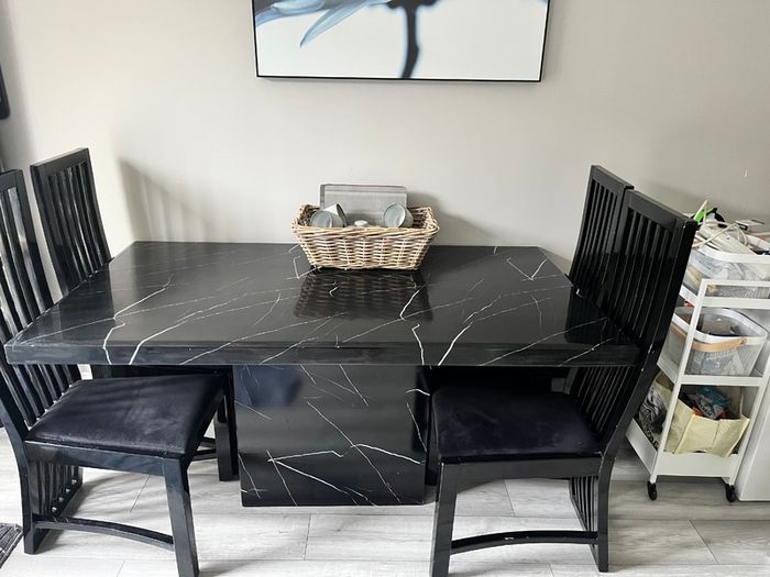 Table and chairs and glass cabinet