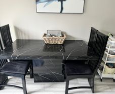 Table and chairs and glass cabinet