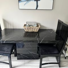 Table and chairs and glass cabinet