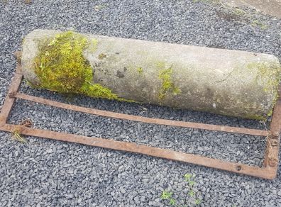 Antique limestone roller.