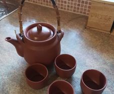 Brand New Clay Teapot with 4 Matching cups