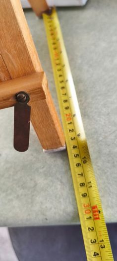 Propp it foldable wooden book holder.