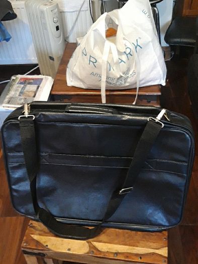 Nescafe shoulder cross bag. Travelling bag with suit case.