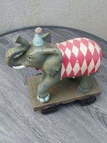Beautiful Elephant on Metal Wheels