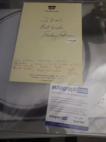 Smokey Robinson signed page with Coa