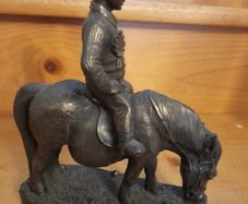 Genesis figure boy on a horse with a Rosette