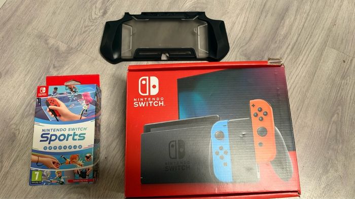 Nintendo Switch with sports and case like new