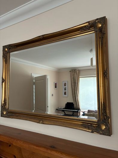 Ornate antique overmantel mirror
