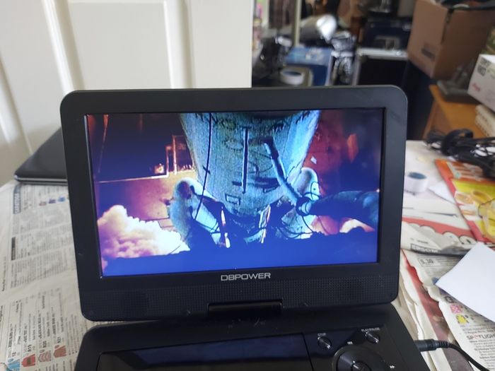 5 Portable DVD Players, all working, but no charges for them, all in very good condition