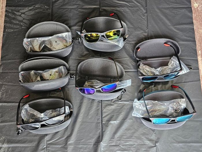Job lot of kids sunglasses including cases