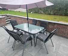 6 seater patio set and parasol