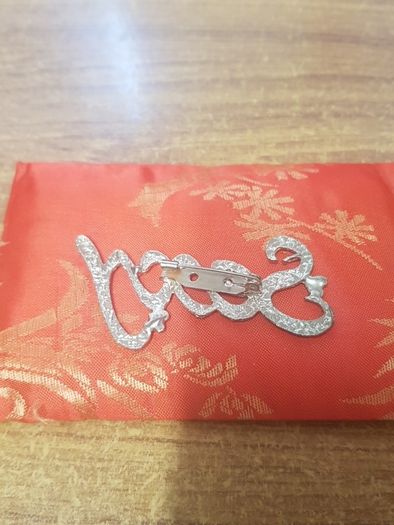 "Sexy" brooch