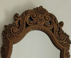 Vintage ornate bronze mirror
