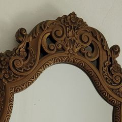 Vintage ornate bronze mirror
