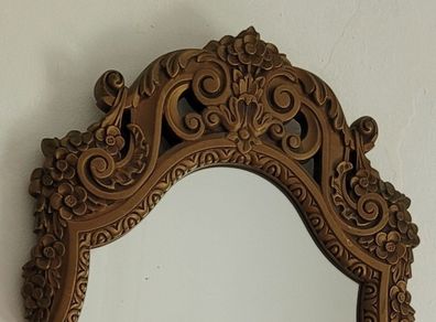 Vintage ornate bronze mirror