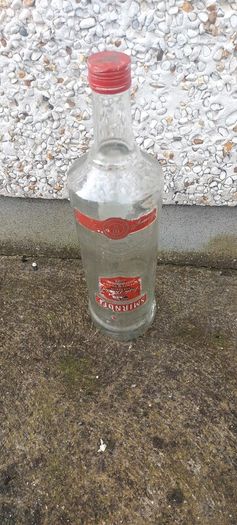 Smirnoff volka 3 litre bottle ,,with cork ,nice patina condition, handy for 1 or 2 euro coins ,etc ,,or display advertising item for home bar etc ,sold as is,