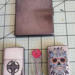 Old Zippos, Zippo flints, and a steel smokes case