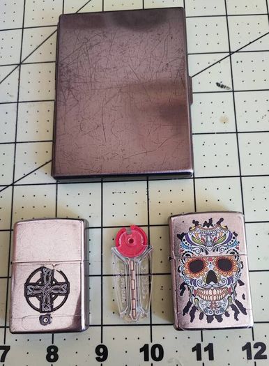 Old Zippos, Zippo flints, and a steel smokes case