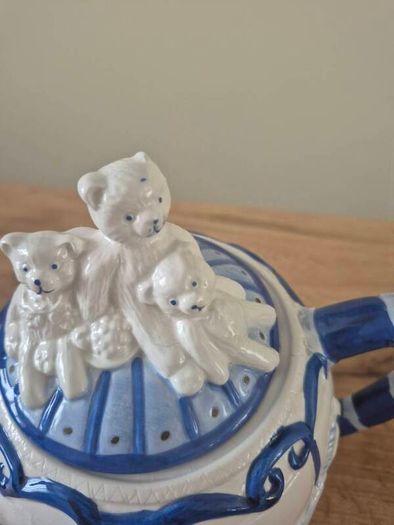 Blue and white ceramic teapot with quartz clock
