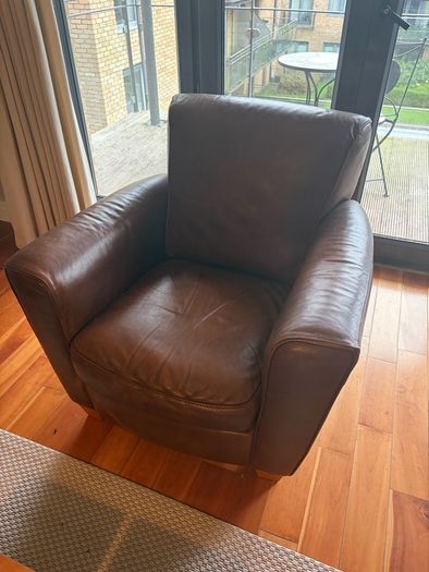 brown leather couch and chair