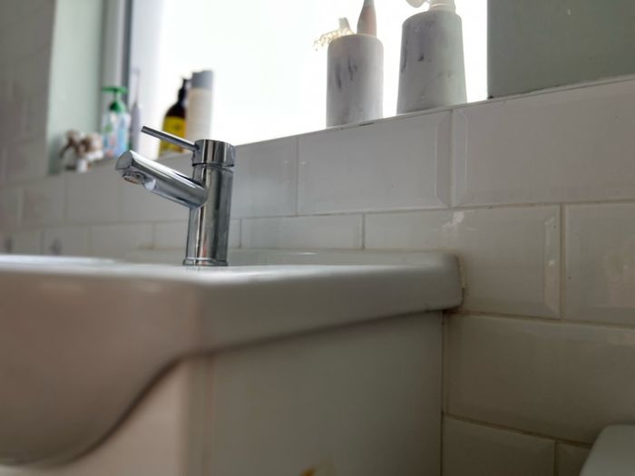 white sink bathroom- not including tap