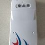 Toy Campervan - White with blue and red decals Image 2