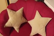 2 cream star shaped velvet cushions