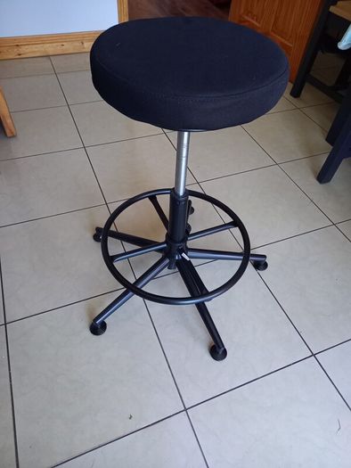 Adjustable massage table and swivel stool