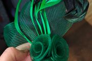 Beautiful green with both brooch and hair clip fastening Fascinator