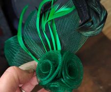 Beautiful green with both brooch and hair clip fastening Fascinator