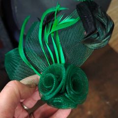 Beautiful green with both brooch and hair clip fastening Fascinator