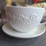 plant pot in the shape of a cup and saucer. Image 6
