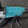 Makita GA9020S  corded angle grinder,  complete with a diamond blade. Image 2