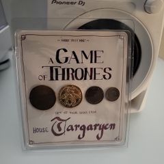 A Game of Thrones set of four coins from house targaryen official