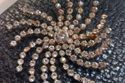 V large brooch, star burst design, D18 post 4e