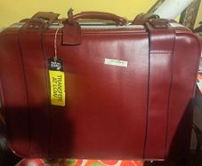 Oxblood red burgundy leather expanding travel suitcase vintage
