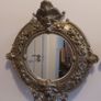 Stunning Pair of Antique Highly Detailed Rococo/Late Baroque Solid Cast Brass Round Mirror Frames with Cherubs Head, Satyr, Flowers and Foliage, One with Mirror and One Without Mirror, Circa 19th Century Image 4