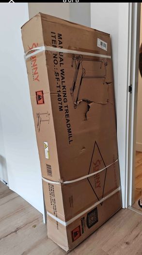 Manual Compact foldable treadmill with transportation wheels for easy portability.   Folded dimension: 20Lx23Wx50h in.