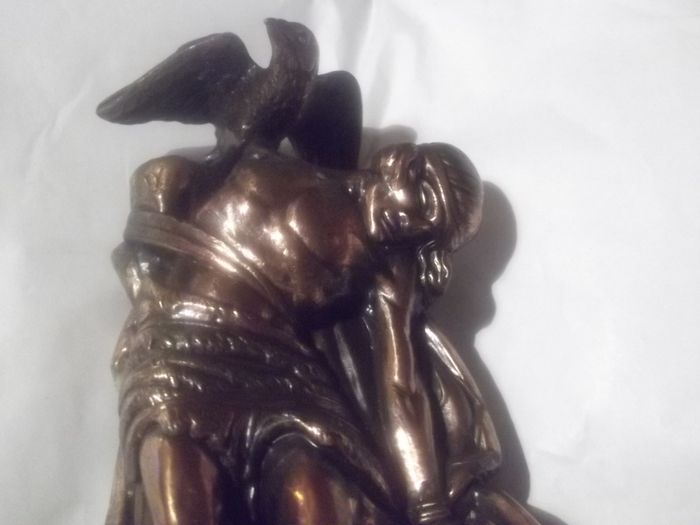 a bronze or metal the death of cuchulainn statue