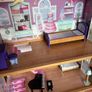 Large wooden dolls house with furniture Image 2