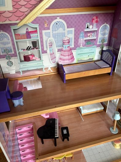 Large wooden dolls house with furniture