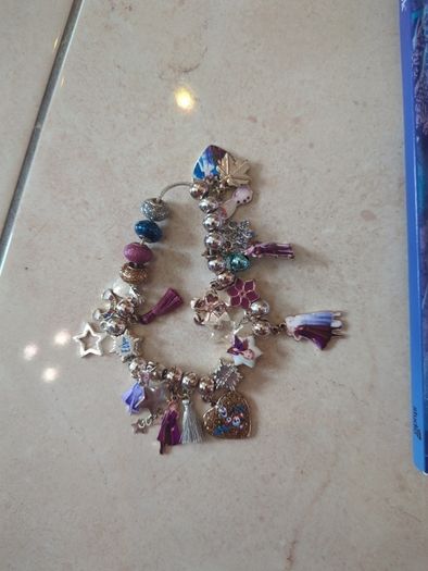 Disney frozen book with magic music player and charms