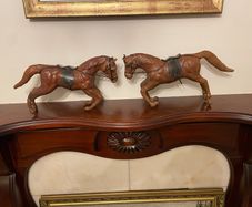 Pair of Antique leather horses