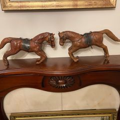 Pair of Antique leather horses