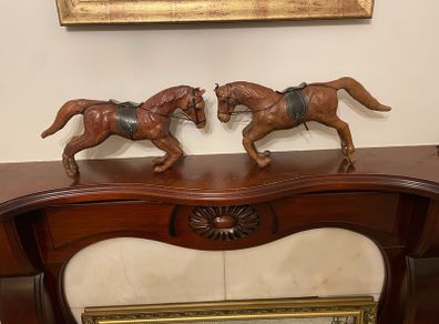 Pair of Antique leather horses