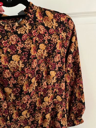 An elegant dress in floral print