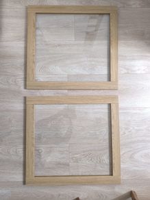 Original IKEA BESTA cabinet door/front panel in discontinued natural oak finish with clear glass centre.