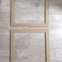 Original IKEA BESTA cabinet door/front panel in discontinued natural oak finish with clear glass centre.