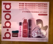 B. old The Showstopper 7 Piece Tanning Gift Set New and Sealed