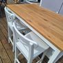 White kitchen island unit with 2 white high chair Image 2